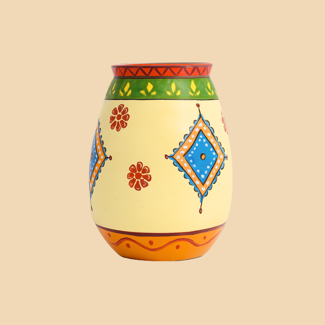 Decorative vase with colorful patterns on a beige background