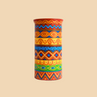 Colorful patterned vase on a beige background